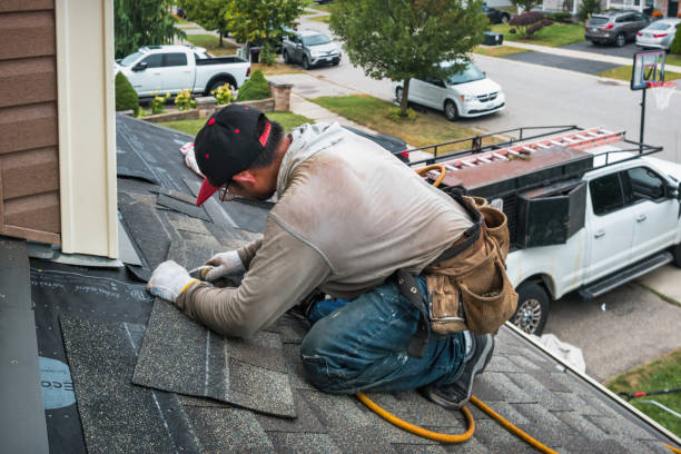 Professional Roofing technician working in Abington, CT